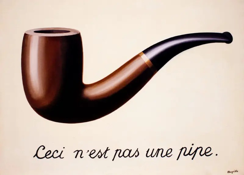 René-Magritte-–-The-Treachery-o.jpg